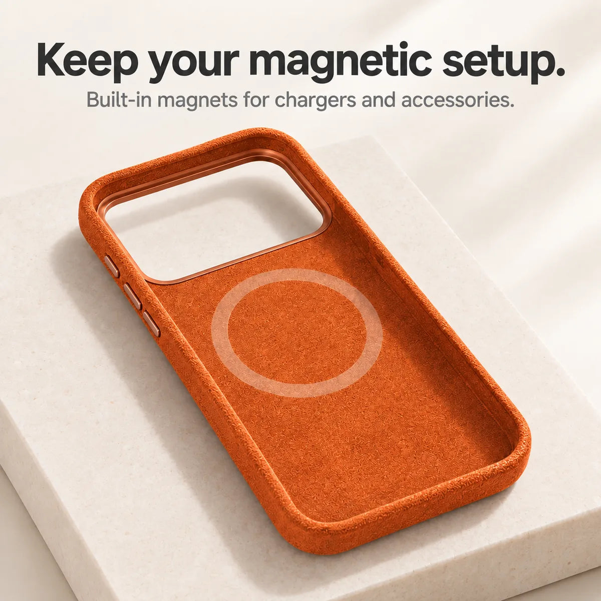 Orange fabric phone case interior showing the circular magnetic ring. #color_Cosmic Orange
