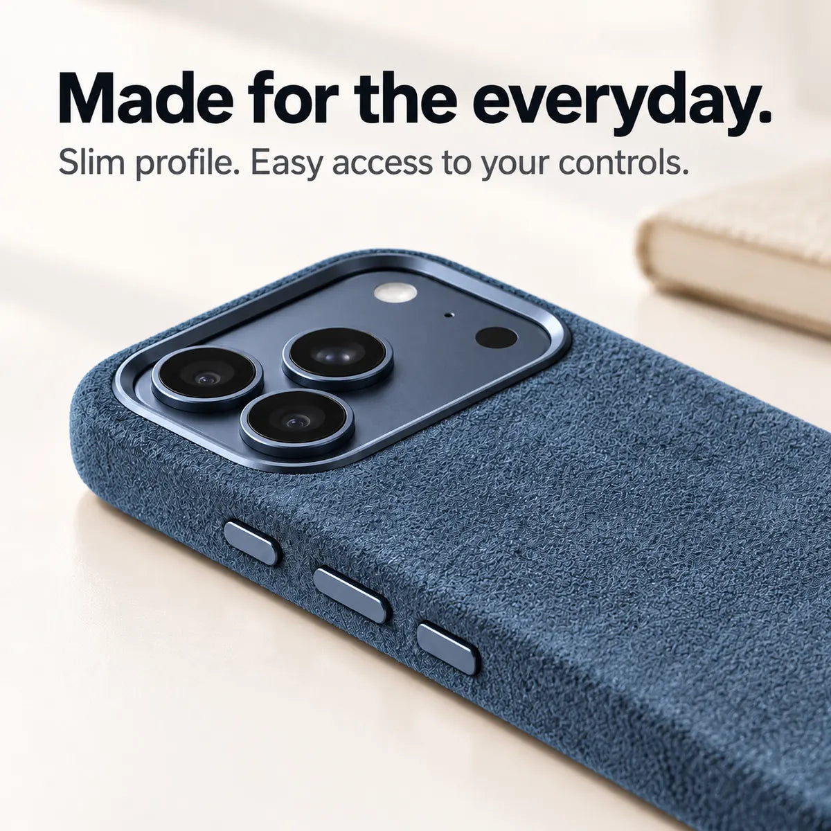 Blue fabric phone case with a close view of its slim side and controls. #color_Deep Blue