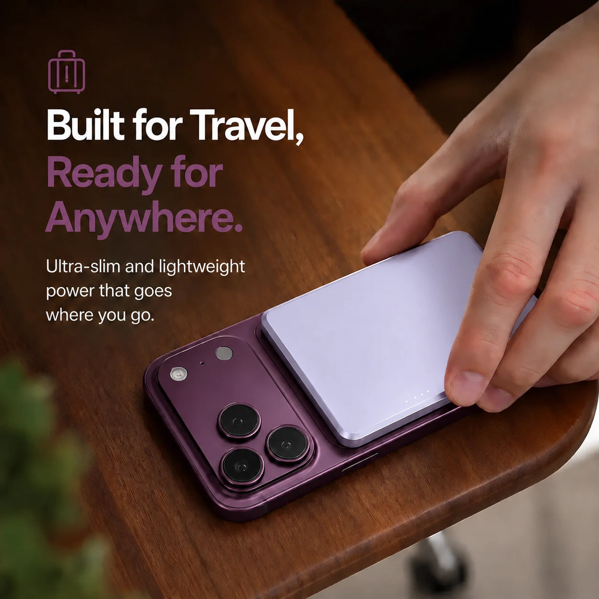 Lavender slim magnetic power bank being packed for travel #color_Lavender
