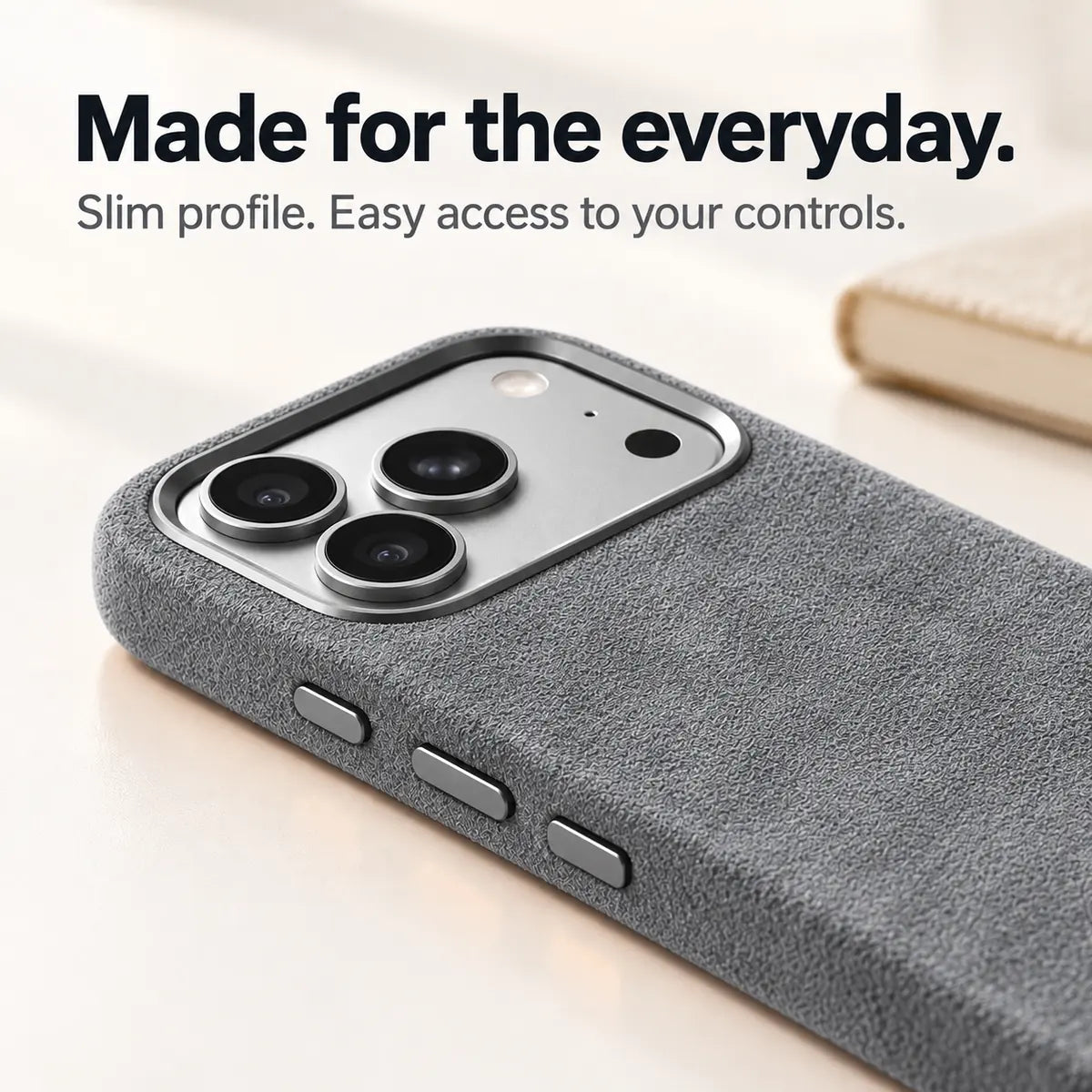 Light gray fabric phone case with a close view of its slim side and controls. #color_Mist Gray