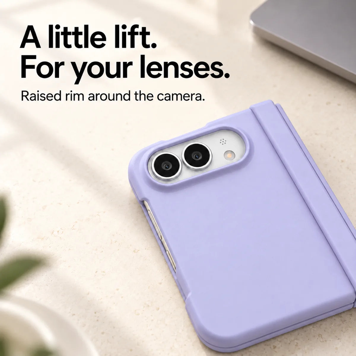 Close-up of the raised Light Purple camera rim on a matte iPhone Ultra case resting on a light desk. #color_Lilac Mist