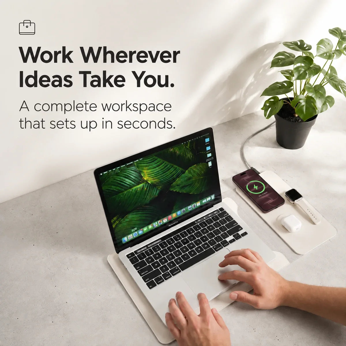Cloud White wireless charging laptop sleeve used as a travel desk. #color_Cloud White