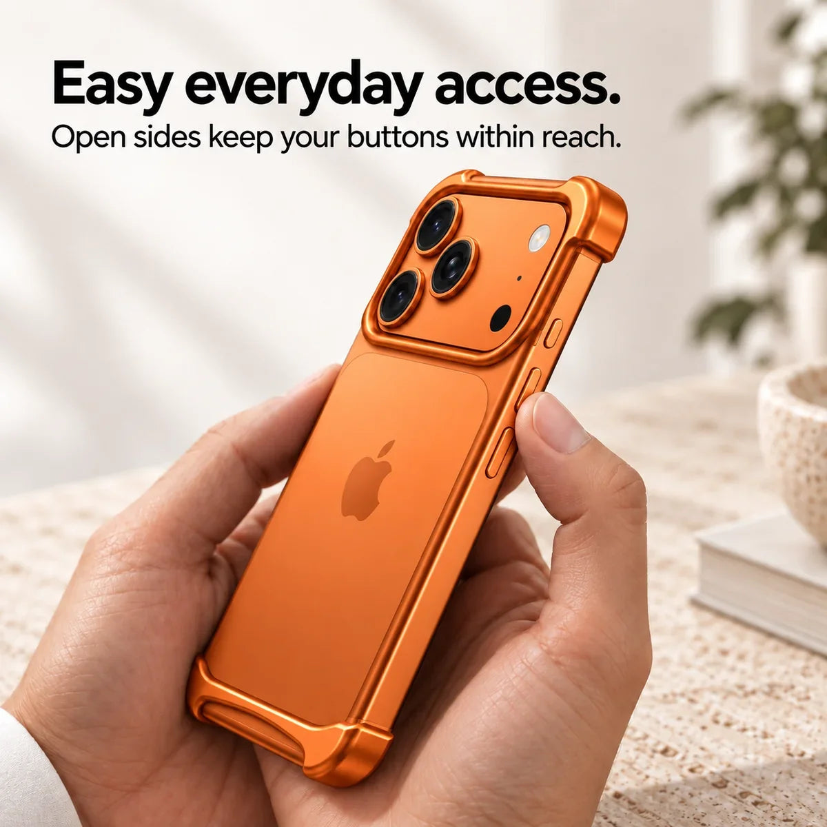 Orange metal phone bumper held in hand showing access to the side buttons #color_Cosmic Orange