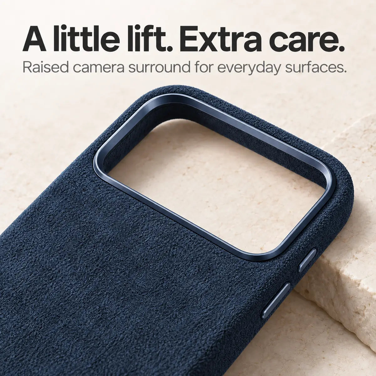 Navy blue fabric phone case with a close view of the raised camera surround. #color_Navy Blue