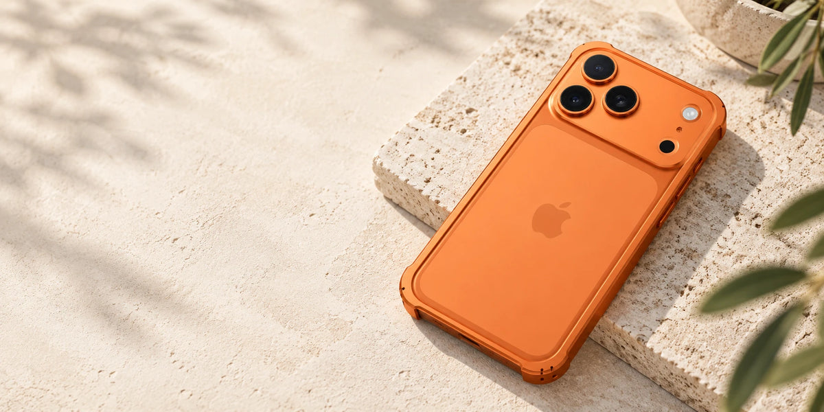 Orange aluminum phone bumper surrounding an exposed orange phone back.